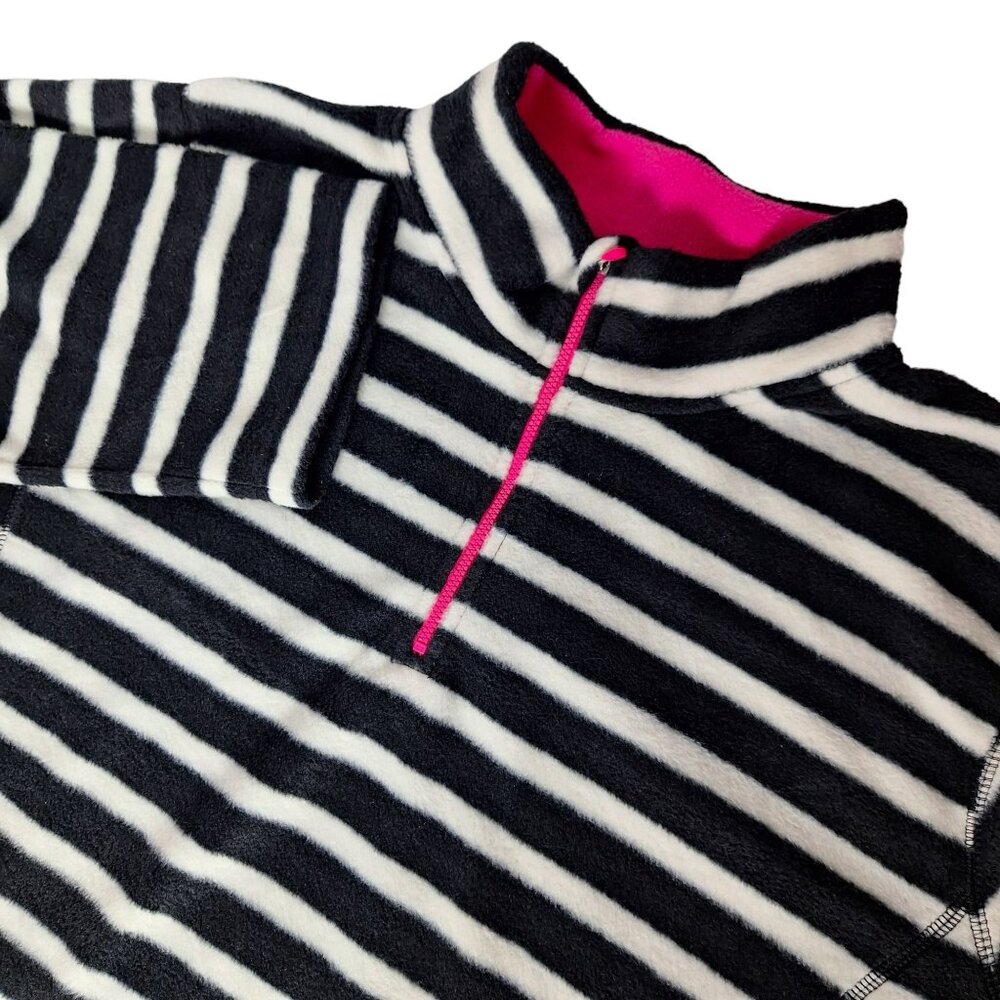 Woman Within Black and White Striped Sweatshirt with Pink Accents